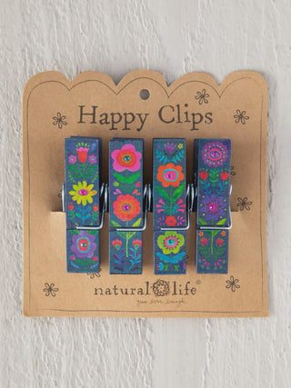 Set of four colorful floral-patterned clothespins on a 'Happy Clips' card