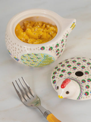 Decorative ceramic container with food, a chicken-shaped lid