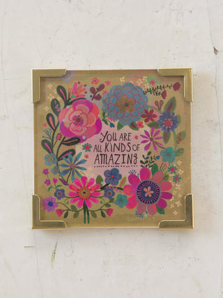 Decorative magnet with floral design and motivational quote