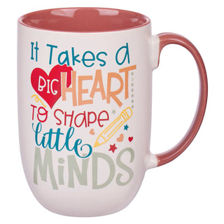 White teacher mug with motivational quote, colorful design, and red handle