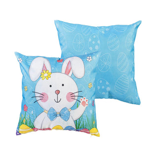 Decorative pillow with a cartoon bunny design on a blue background