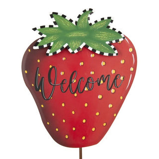 A decorative strawberry-shaped garden stake with a red body, green leaves, yellow seed details, and the word 'Welcome' in black script on the front, shown on a white background.