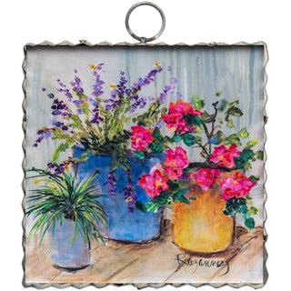 Round Top Charm metal sign with potted plants and flowers 