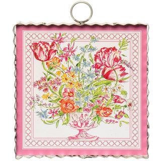Floral design Round Top Charm on a pink background with decorative border
