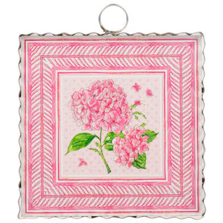 Decorative pink floral design on a white background