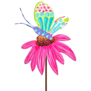Colorful butterfly on a pink flower with a white background