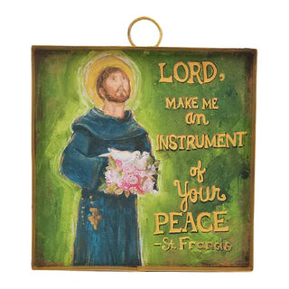 Decorative plaque with St. Francis holding a dove and flowers, with text 'Lord, make me an instrument of your peace - St.