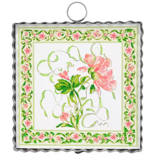 Decorative panel with floral design and white elephant, framed by pink and green flowers.