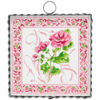 Decorative panel with pink floral design and decorative border on a white background