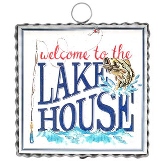 Decorative sign with 'Welcome to the Lake House' text and fish illustration on a white background.