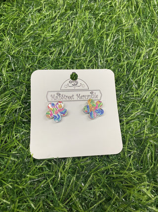 Celebrate Cinco de Mayo in style with these flower shaped quirky Fiesta Studs! Featuring fun and colorful symbols of the holiday, these acrylic earrings are sure to add a playful touch to any outfit.