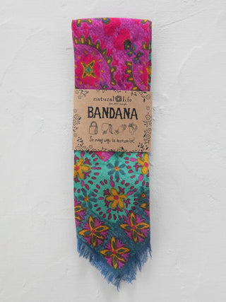 Colorful bandana with floral patterns on a white background