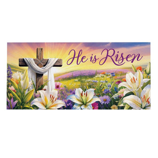 Cross with 'He is Risen' text in a field of flowers and lilies.