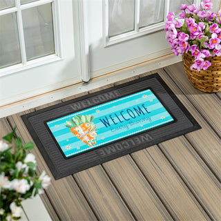 Decorative doormat with 'Welcome' text on a wooden deck
