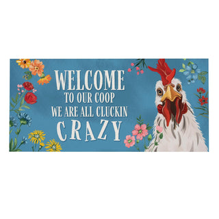 Decorative sign with a rooster and floral elements on a blue background, featuring text.