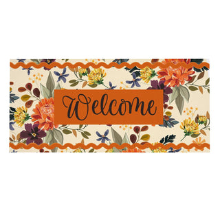A rectangular decorative sign or banner with a floral border and a central orange panel reading “Welcome” in black script, shown on a plain white background.