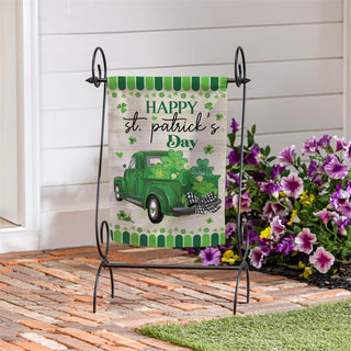 Decorative garden flag with a green truck and shamrocks 