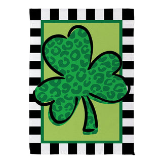 Black and white striped border with a green cheetah print shamrock on a light green background