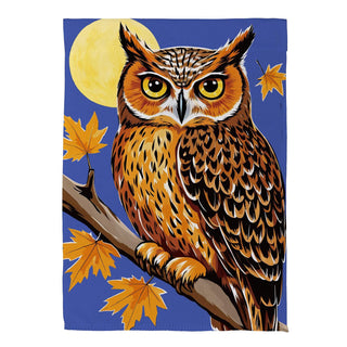 Owl on a branch with autumn leaves and a full moon in the background