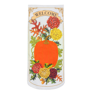 A vertical white decorative banner or wall hanging with rounded corners, featuring a large orange pumpkin surrounded by red, yellow, and burgundy flowers, green leaves, acorns, and a beige banner at the top that reads “WELCOME.”.