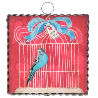 Decorative with a blue bird, red background, and 'be my twiddle' text.