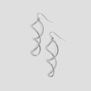 Silver spiral earrings on a white background