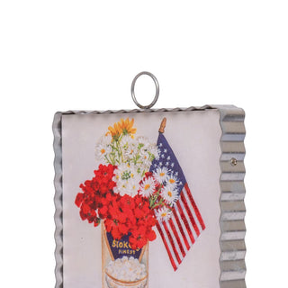 Round Top Charm with flowers and an American flag on a white background