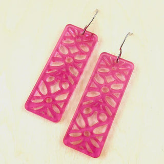Pink rectangular earrings with cut-out designs 