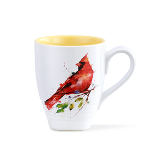 White mug with a red cardinal design on a white background